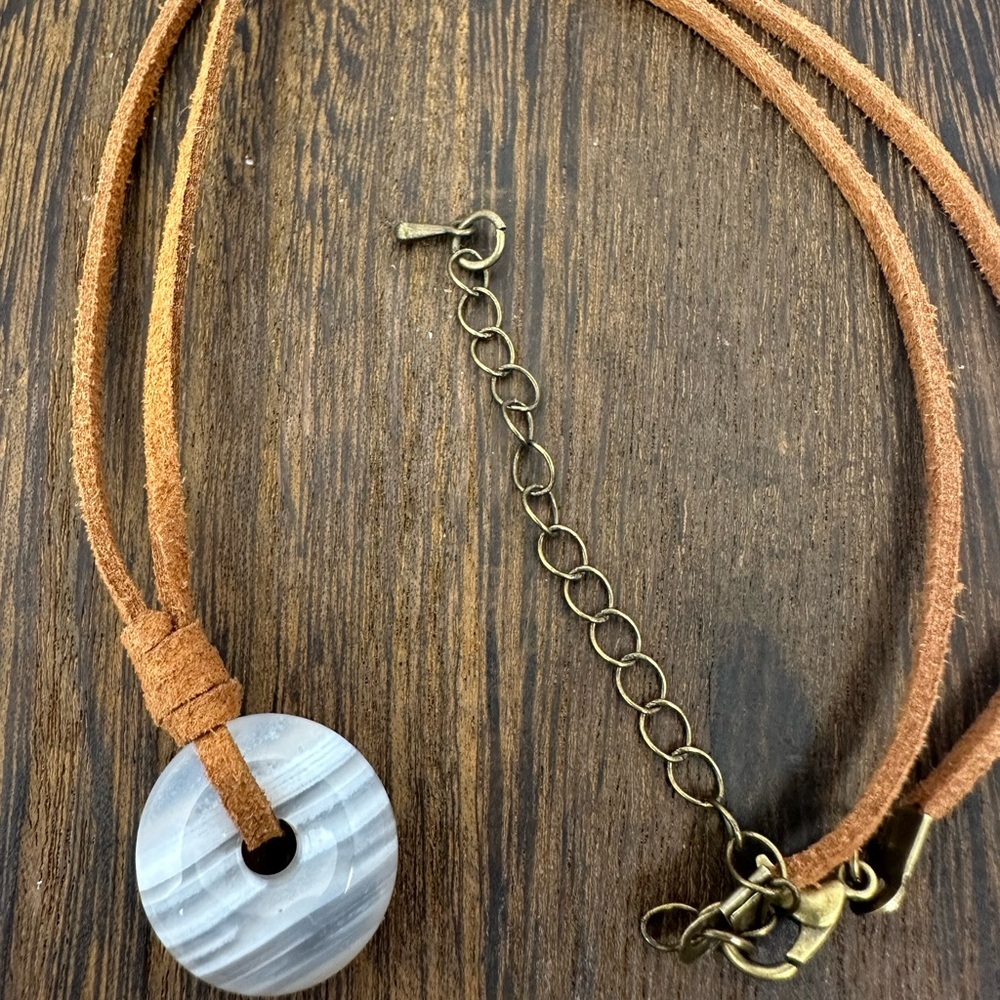 Small Banded White Agate Donut Pendant Necklace on Brown Suede - Picture 12 of 14